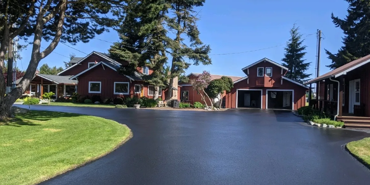 Large estate driveway with farmstead freshly sealed