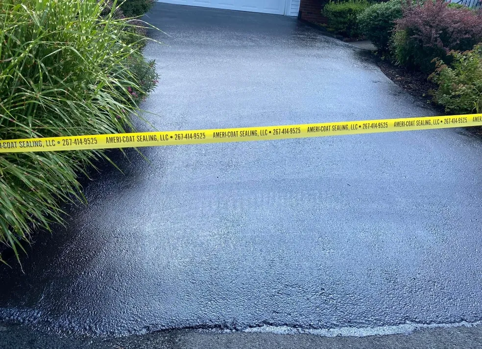 Close-up of premium fresh sealcoat finish with Ameri-Coat tape